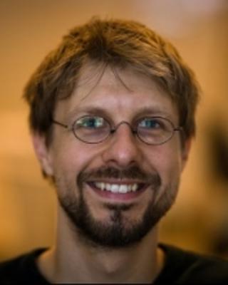 hilfinger_headshotsmall.jpg